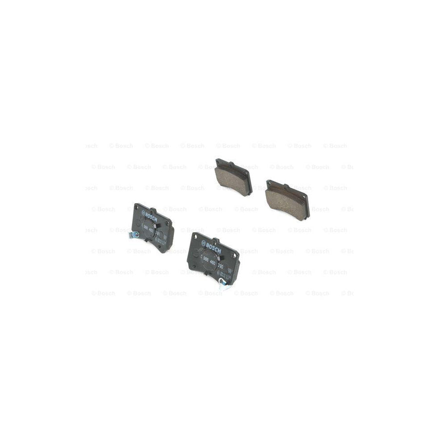 Bosch 0986460390 Brake Pad Set For Mazda 323 With Acoustic Wear Warning With Piston Clip BP497